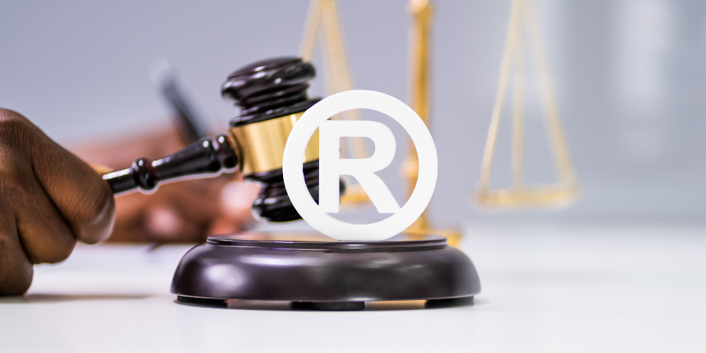 Trademark lawyer gavel with registered symbol